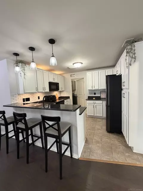 Kitchen - 7013 Boulder Pointe, Washington, MI 48094 photo 2 of 6