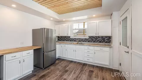 Kitchen - 1413 S 3rd, Escanaba, MI 49829 photo 1 of 2