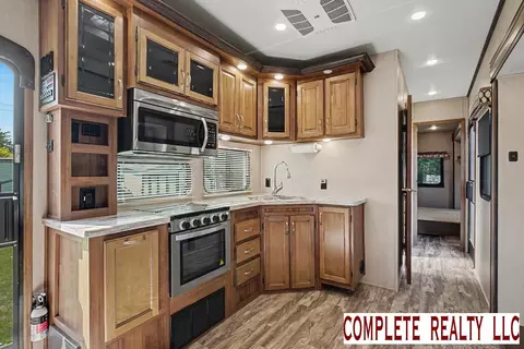 Kitchen - 831 S Main UNIT 213, Au Gres, MI 48703 photo 2 of 3