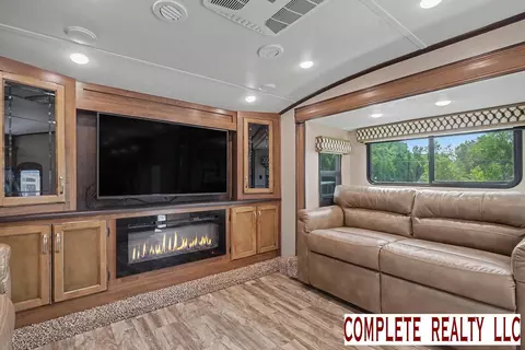 Living - 831 S Main UNIT 213, Au Gres, MI 48703 photo 3 of 3