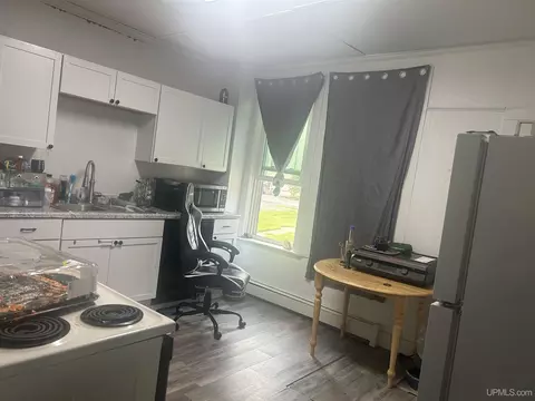 Kitchen - 313-315 E Pearl, Ishpeming, MI 49849 photo 1 of 5