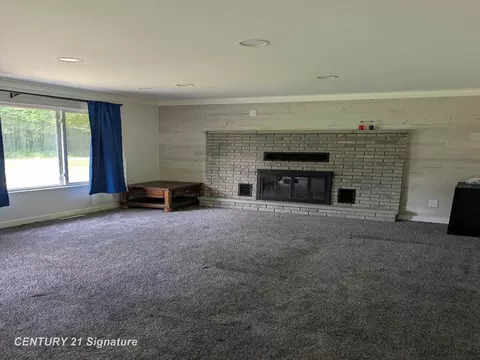 Living - 1921 Ann, Burt, MI 48417 photo 2 of 3