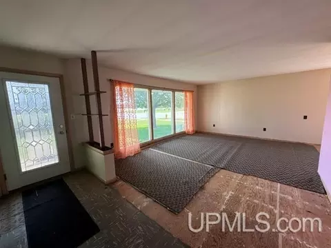 Living - 2430 S 3rd, Escanaba, MI 49829 photo 2 of 2