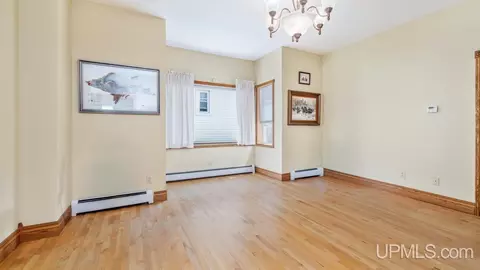 Living - 923 S 6th, Escanaba, MI 49829 photo 1 of 4