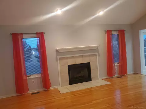Living - 50262 Barrett, Macomb, MI 48044 photo 1 of 2
