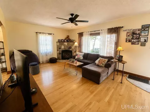 Living - 828 Michigan St, Ishpeming, MI 49849 photo 1 of 2