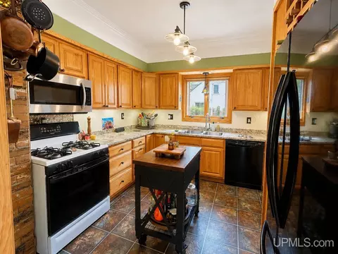 Kitchen - 828 Michigan St, Ishpeming, MI 49849 photo 1 of 3
