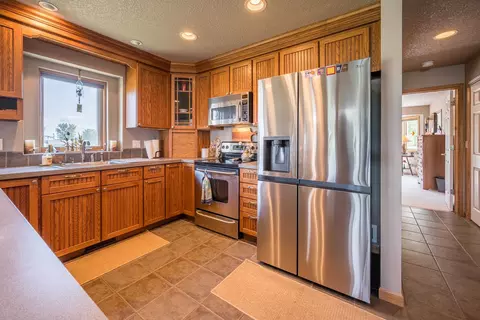 Kitchen - 1780 Castleview #49, Gladwin, MI 48624 photo 3 of 4