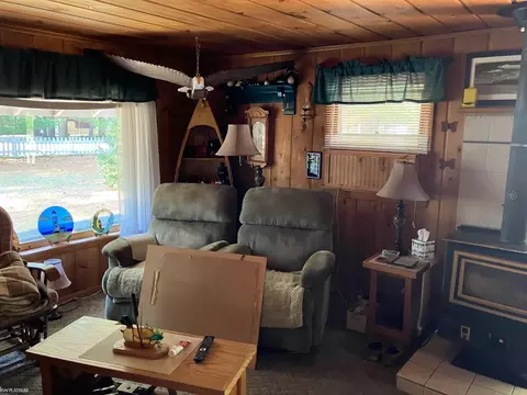 Living - 9686 Doe, Harrison, MI 48625 photo 2 of 2