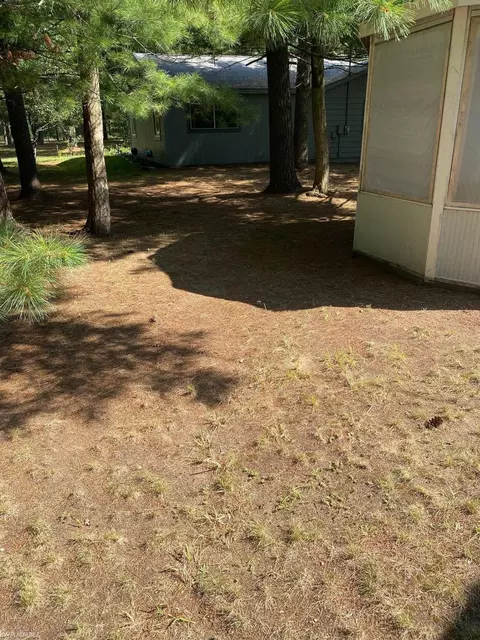 Exterior - 9686 Doe, Harrison, MI 48625 photo 2 of 6