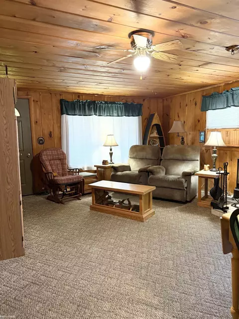 Living - 9686 Doe, Harrison, MI 48625 photo 1 of 3