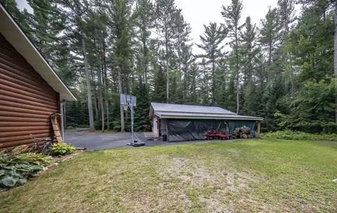 Exterior - 1768 River Bnd, Eagle River, WI 54521 photo 5 of 14