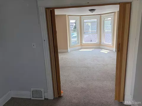 Living - 210 N 13th, Escanaba, MI 49829 photo 7 of 9