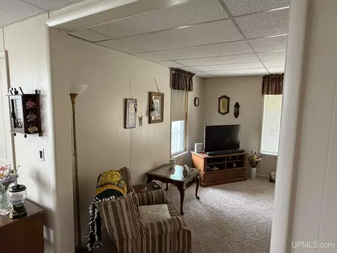 Living - 210 N 13th, Escanaba, MI 49829 photo 1 of 9