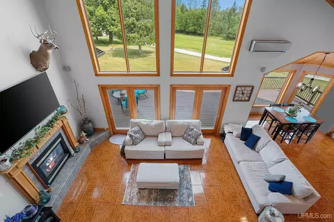 Living - W1677 Orchard, Wilson, MI 49896 photo 5 of 6