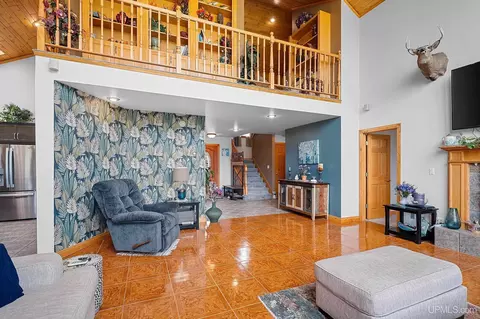 Living - W1677 Orchard, Wilson, MI 49896 photo 4 of 6