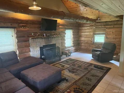 Living - 9450 Co 416, Cornell, MI 49818 photo 2 of 4