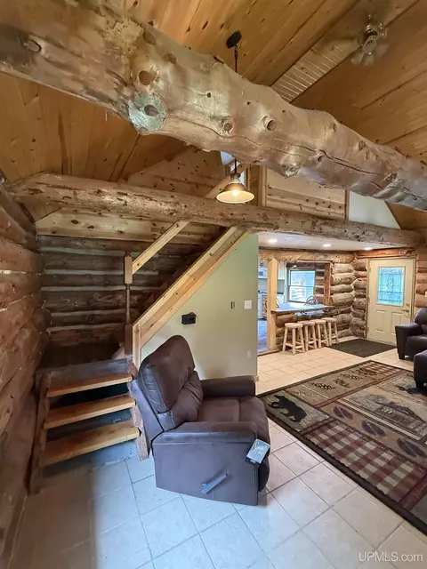 Living - 9450 Co 416, Cornell, MI 49818 photo 3 of 4