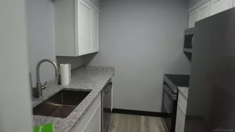 Kitchen - 5400 Maple Rdg #15, Haslett, MI 48840 photo 1 of 3