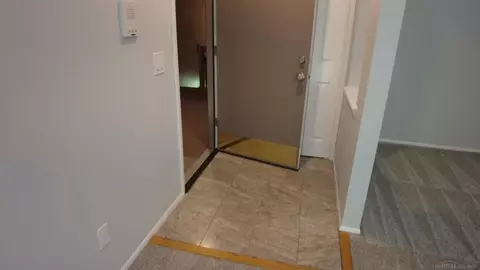 Entry Way - 5400 Maple Rdg #15, Haslett, MI 48840 photo 1 of 2