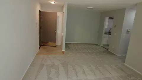Living - 5400 Maple Rdg #15, Haslett, MI 48840 photo 1 of 2