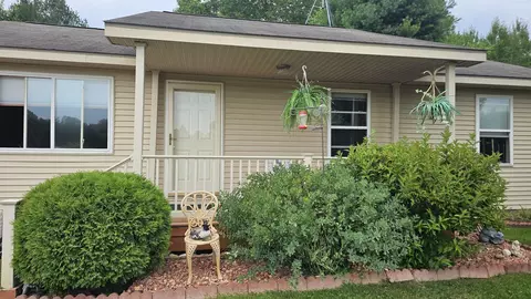 Exterior - 5453 Darby, Gladwin, MI 48624 photo 5 of 16