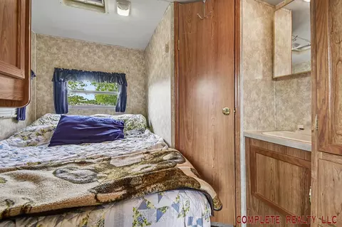 Bedroom - 831 S Main #142 & 143, Au Gres, MI 48703 photo 2 of 3