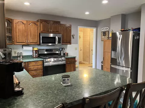 Kitchen - 1000 N Silverleaf, Gladwin, MI 48624 photo 2 of 3
