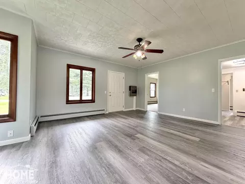 Living - 115 E Grand Riv #1B/1B, Bancroft, MI 48414 photo 1 of 9