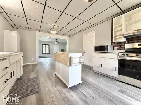 Kitchen - 115 E Grand Riv #1B/1B, Bancroft, MI 48414 photo 5 of 9
