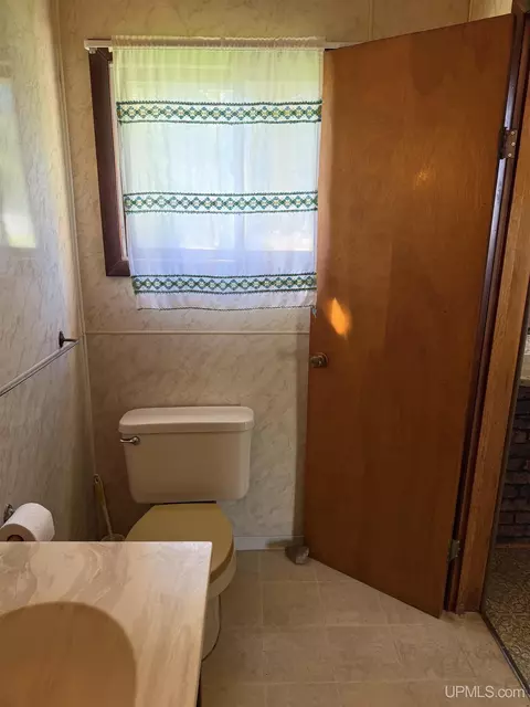 Bath - 522 E Varnum, Munising, MI 49862 photo 2 of 2