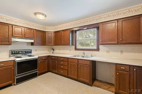 Kitchen - 222 E Maumee, Adrian, MI 49221 photo 2 of 3