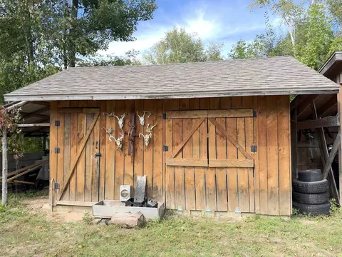 Exterior - 5330 Scottish Hills Dr, Gladwin, MI 48624 photo 3 of 12