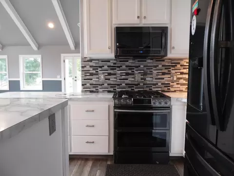Kitchen - 3237 Grass Lk, Gladwin, MI 48624 photo 6 of 7