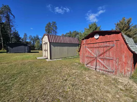 Exterior - 10141 Suzanne, Harrison, MI 48625 photo 5 of 11