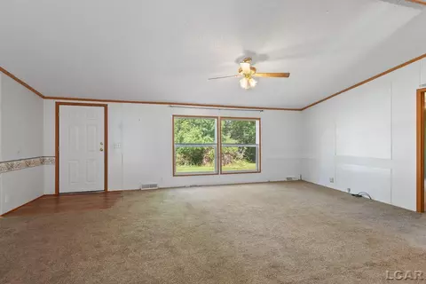 Living - 893 E Siena Hts, Adrian, MI 49221 photo 2 of 7