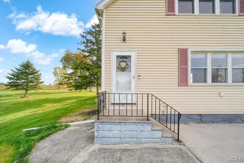 Exterior - 8231 Coman, Hudson, MI 49247 photo 3 of 16