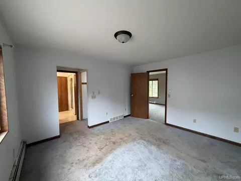 Bedroom - 5343 E M94, Munising, MI 49862 photo 2 of 7