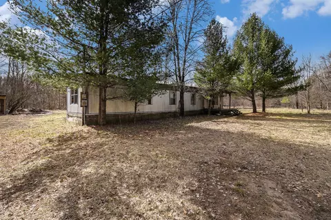Exterior - 8573 E Anne, Walkerville, MI 49459 photo 4 of 8