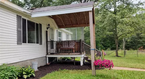 Exterior - 16037 4 Mile, Morley, MI 49336 photo 5 of 13