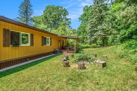 Exterior - 356 W Temple Dr, Harrison, MI 48625 photo 4 of 9