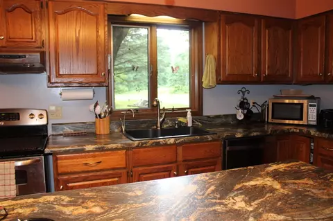 Kitchen - 7227 Greenwood Rd, Gladwin, MI 48624 photo 3 of 4