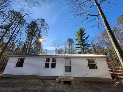 Exterior - 255 E Skyline, Roscommon, MI 48653 photo 3 of 29