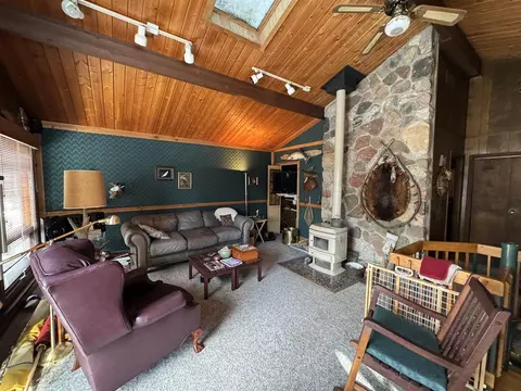 Living - 9463 E Pomeroy Spgs, Irons, MI 49644 photo 1 of 4