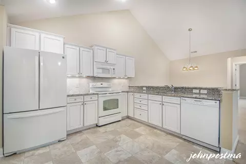 Kitchen - 830 Bridge Walk, Ada, MI 49301 photo 1 of 3
