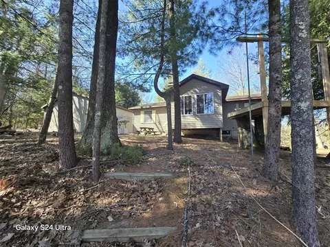 Exterior - 5604 N Mac, Irons, MI 49644 photo 6 of 21