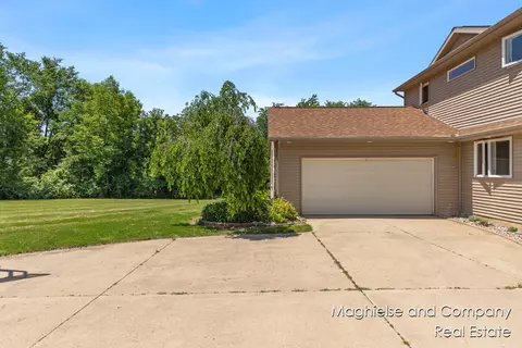 Exterior - 1507 146th, Dorr, MI 49323 photo 5 of 36