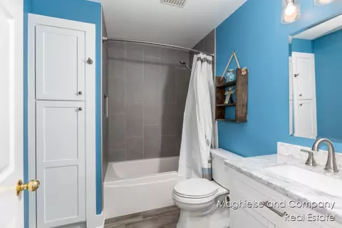 Bath - 1507 146th, Dorr, MI 49323 photo 2 of 6