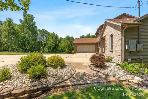 Exterior - 1507 146th, Dorr, MI 49323 photo 4 of 36