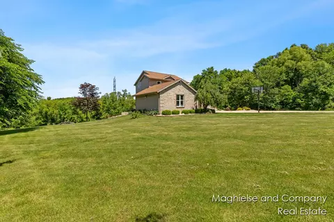Exterior - 1507 146th, Dorr, MI 49323 photo 6 of 36